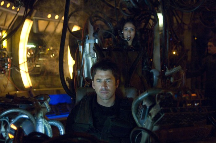 Lt. Colonel John Sheppard (Joe Flanigan) races to beat the Wraith to Drs. McKay and Jackson.
