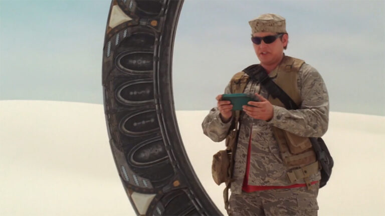 Eli stands at the Stargate on a desert world ("Air, Part 3")