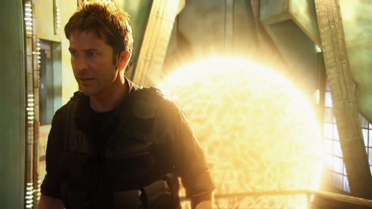 Sheppard and the exploded Stargate ("First Contact")